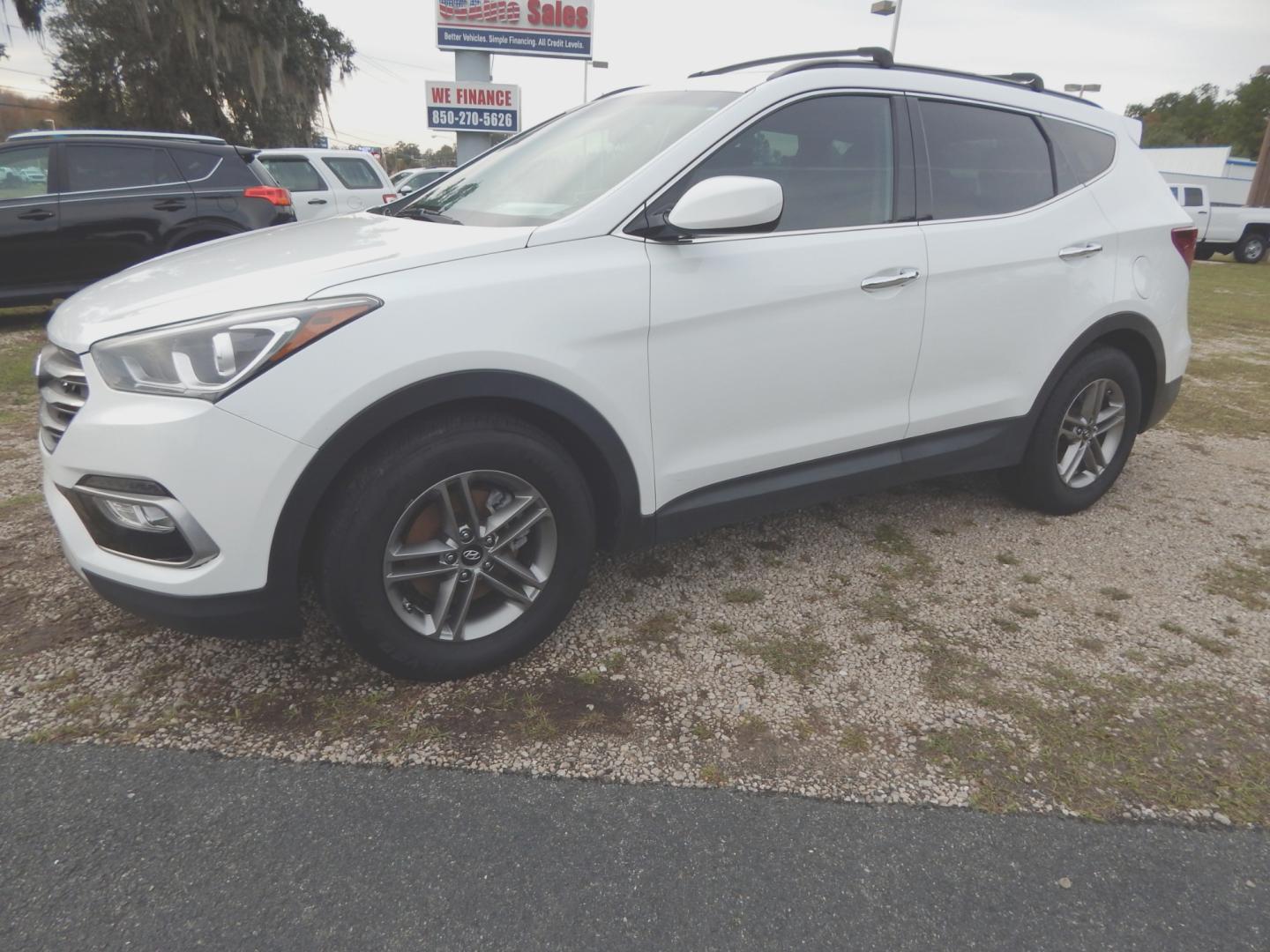 2017 White /Gray Hyundai Santa Fe Sport (5NMZU3LB8HH) with an 2.4L engine, Automatic transmission, located at 3120 W Tennessee St, Tallahassee, FL, 32304-1002, (850) 575-6702, 30.458841, -84.349648 - Used Car Supermarket is proud to present you with this loaded immaculate 2017 Hyundai Santa Fe Sport with low miles. Used Car Supermarket prides itself in offering you the finest pre-owned vehicle in Tallahassee. Used Car Supermarket has been locally family owned and operated for over 48 years. Our - Photo#0